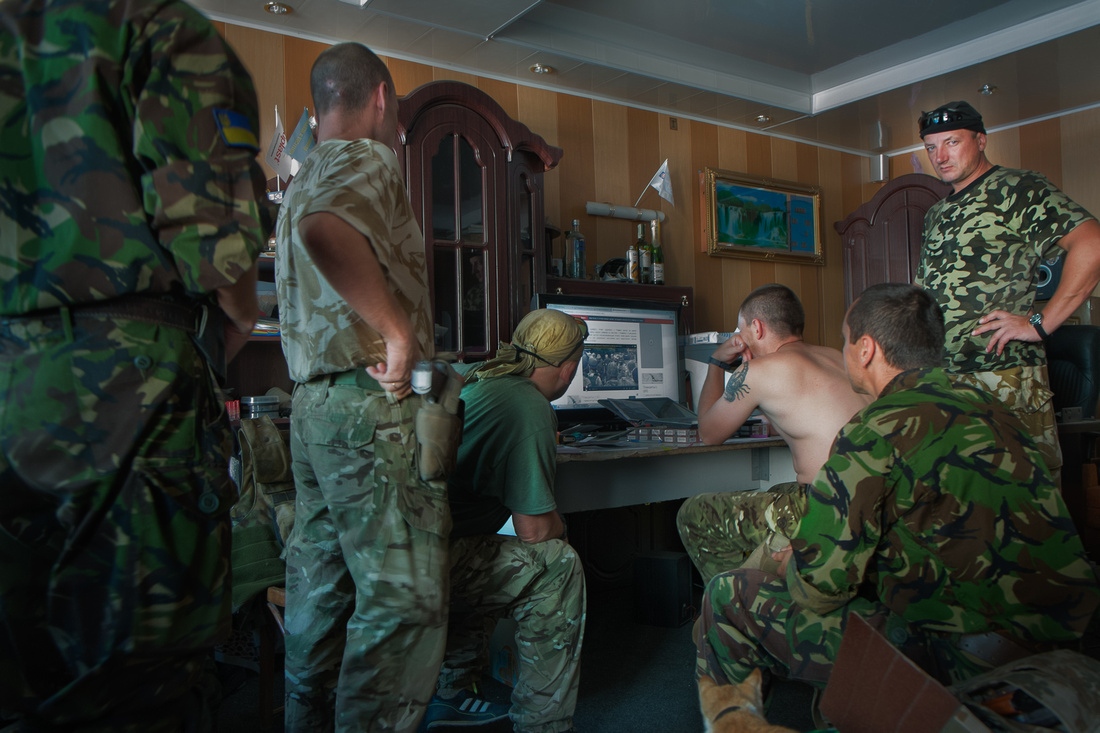 Citizen Soldier- Ukraine -     Members of Battalion Donbas study social media sites...