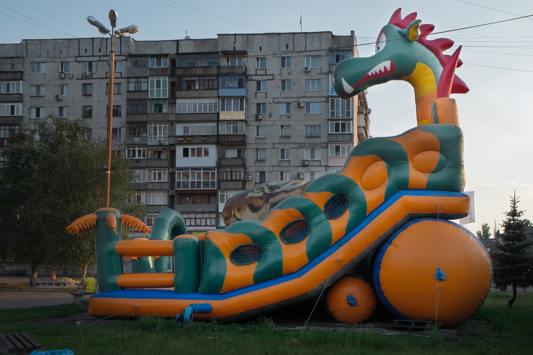 Citizen Soldier- Ukraine -     A children's playground outside the gates of the...