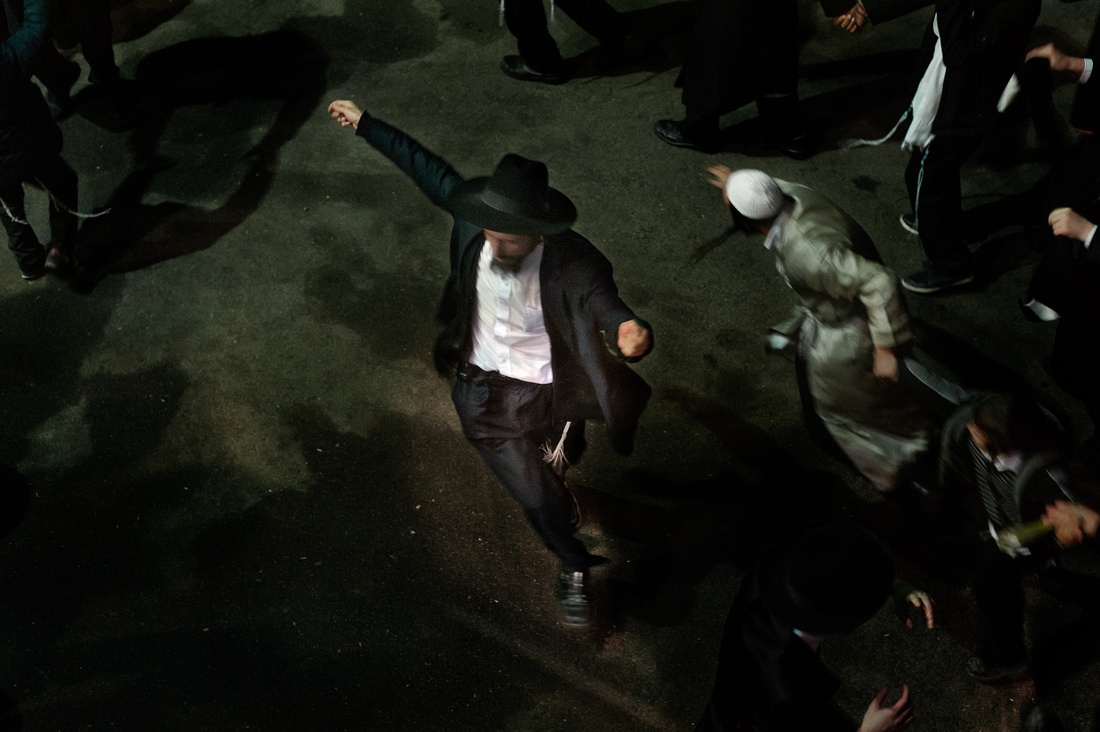 Rosh Hashanah- Ukraine -     Breslover Hassidic Jews dance to klezmer music after...