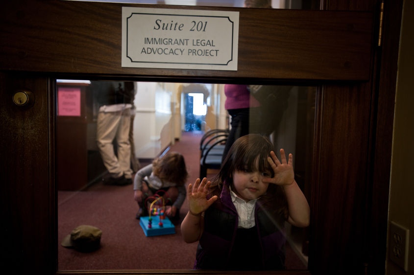     Danika Garcia, 5, waits for her father Fidel at an immigration services meeting in Portland, Maine, on April 15, 2011. A continuance was issued for Fidel's deportation date and the family must wait until June before a decision is made as to the Salvadoran man's status.    