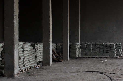     Bags of cement are stored at the DRC warehouse in Osh, Kyrgyzstan. December 2011.     