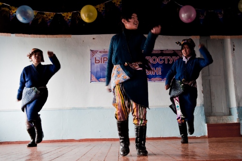     Uzbek students doing a traditional dance at an ethnically mixed school outside of Osh, Kyrgyzstan. December, 2011.     