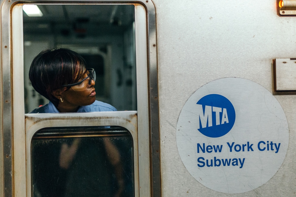 Subway staff ensures that passen_the doors, #NewYork #Subway #USA