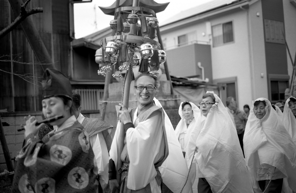 Man carries an alter at a spring festival in Japan