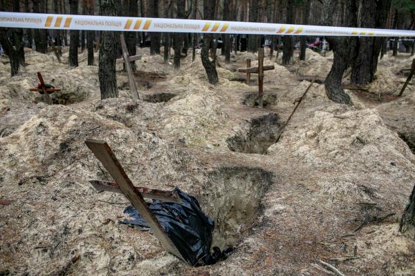 Image from Ukraine-Russia War - Exhumed graves of civilians who died in a violent way,...
