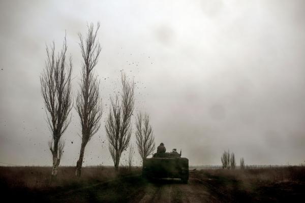 Ukraine-Russia War - Ukrainian soldiers ,driving towards the frontline city of...
