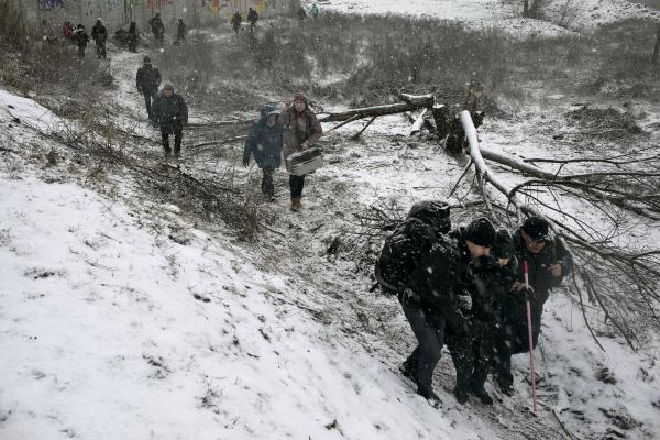 Ukraine-Russia War - Local residents of Irpin evacuating themselves, during...