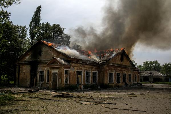 Image from Ukraine-Russia War - A residential home in flames after Russian artillery...