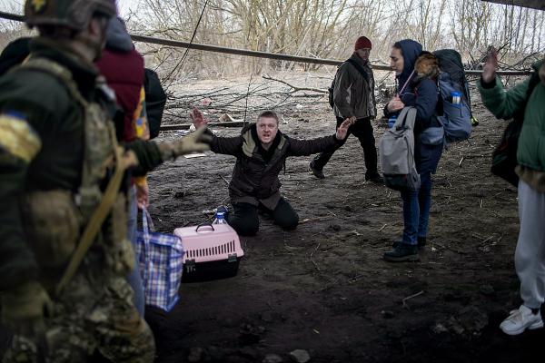 Ukraine-Russia War - On the outskirts of Irpin city,  a civilian,...