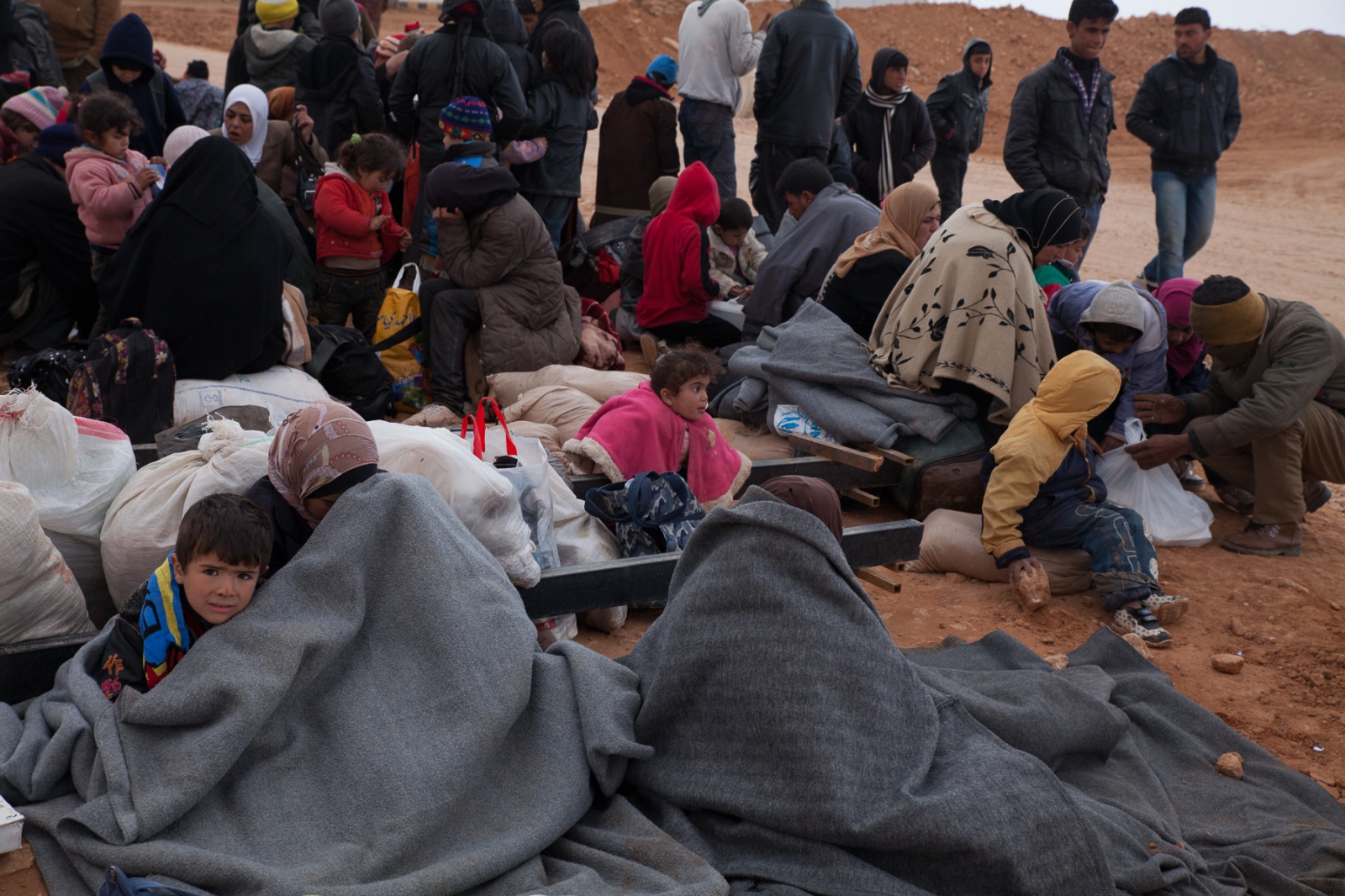 The Syrian Refugee Crisis - These refugees traveled for days to get to the Syrian...