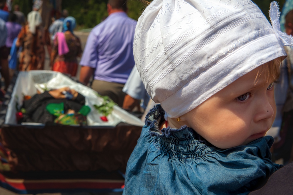 Child at a funeral