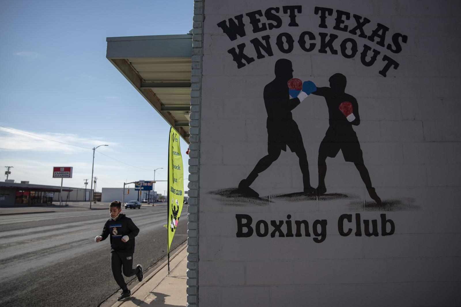 Jose Rubia, 13, jogs past West ...a week, Tuesday through Friday.