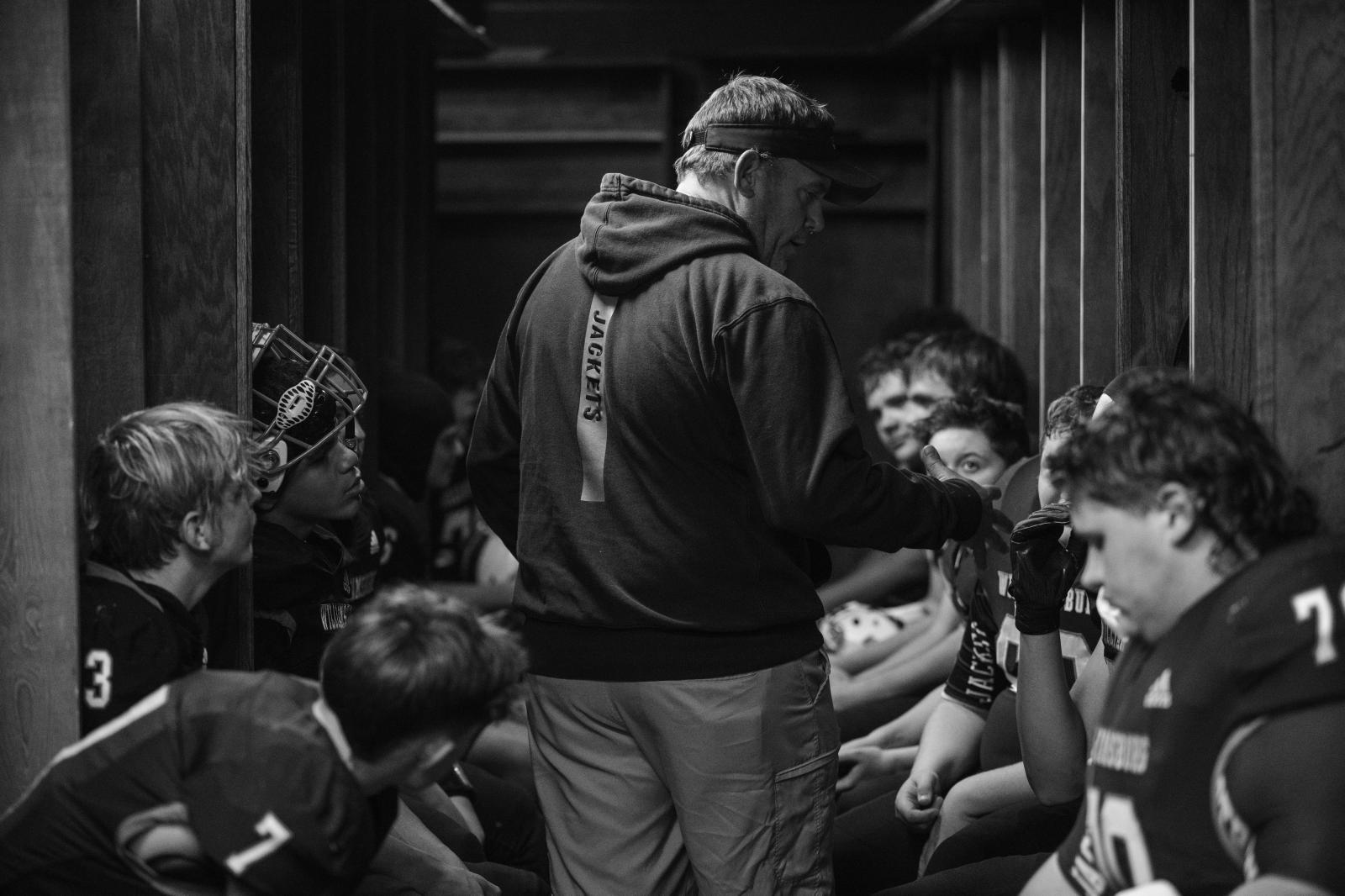 Kind Words, Big Differences - Williamsburg Yellow Jackets look to Vaughn as he gives them a pep talk in the locker room before...