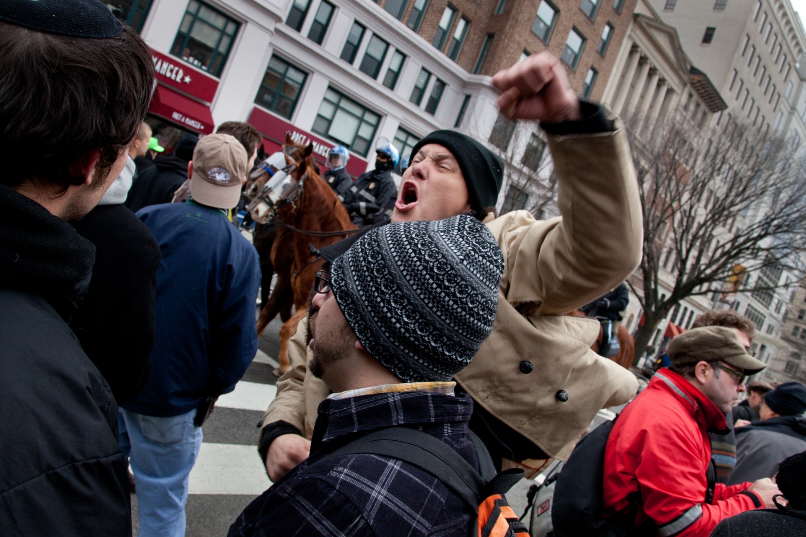Occupy DC - An angry protestor yells at U.S. Park Police after...