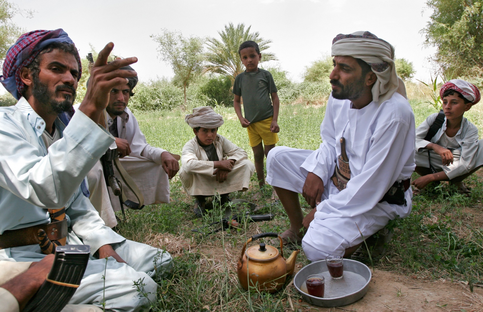 Yemen: Surviving Tribal Wars - Sheik Rabea listens as he mediates one of the many...