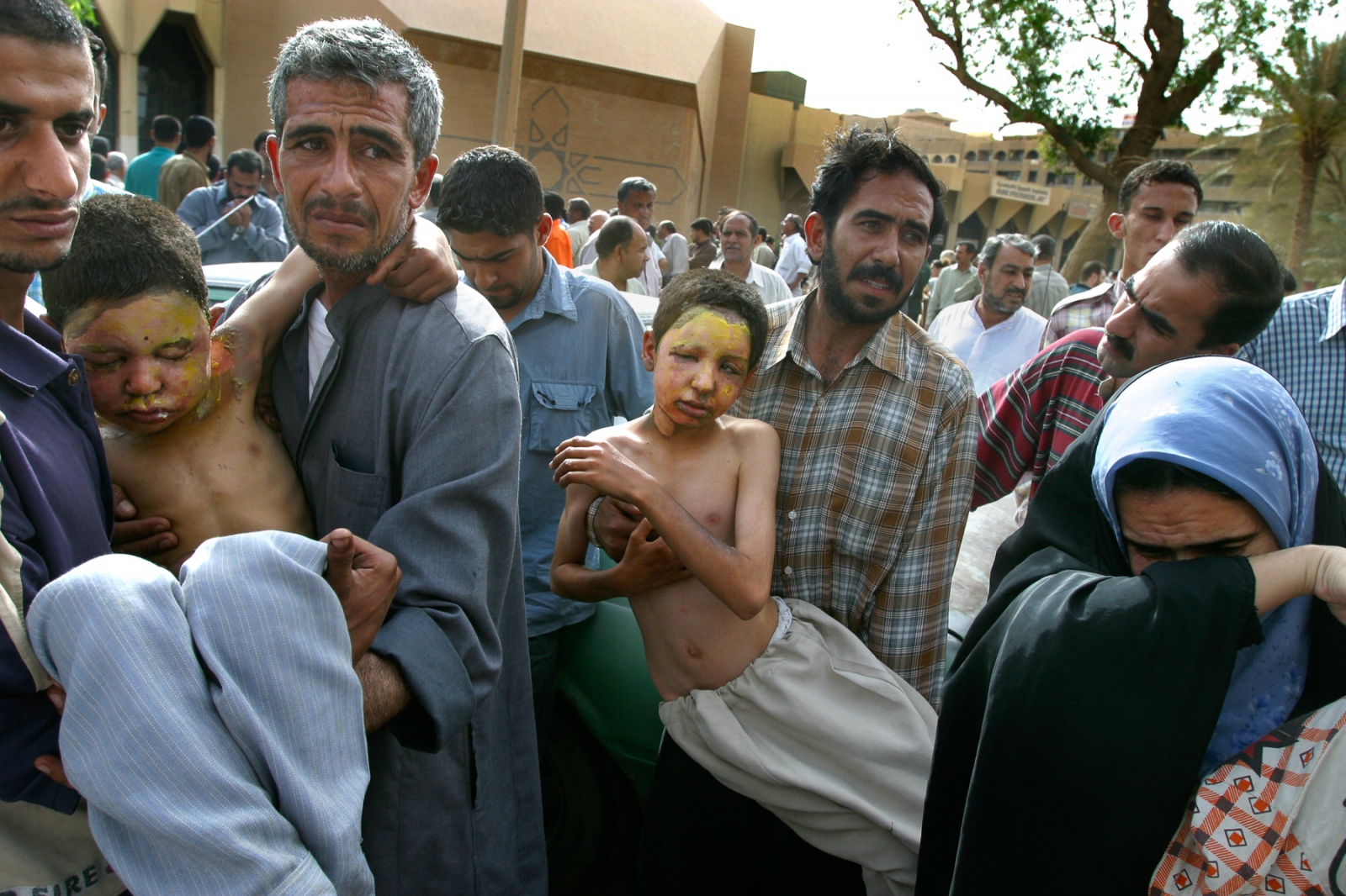 War's Toll on Iraq, 2003 -                                 Three children, who were...