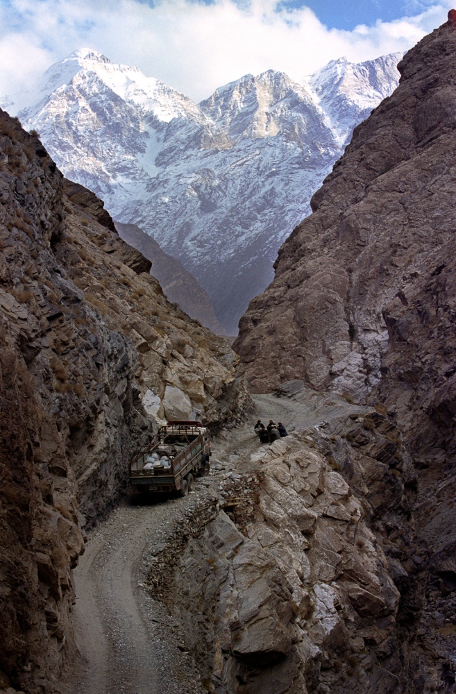 Traveling on treacherous roads thousands of feet up we approach the infamous Anjuman pass.