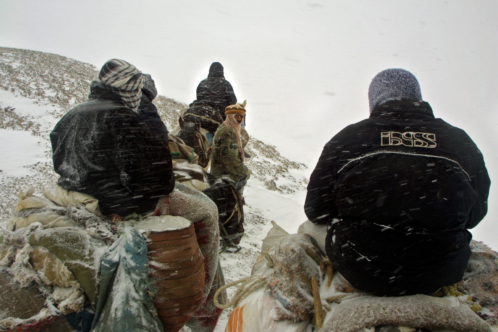 Onward to Kabul - In the blinding storm our guides try to keep us together.