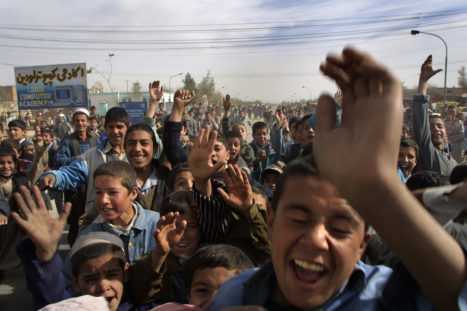 Onward to Kabul - As we arrive in Kabul, a crowd engulfs our car. At first...