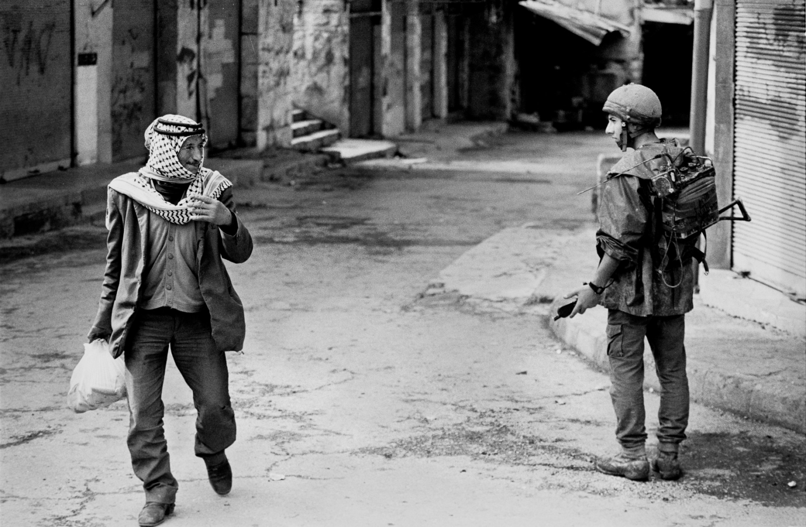 Forgotten Wars - A Palestinian and an Israeli soldier warily eye each...