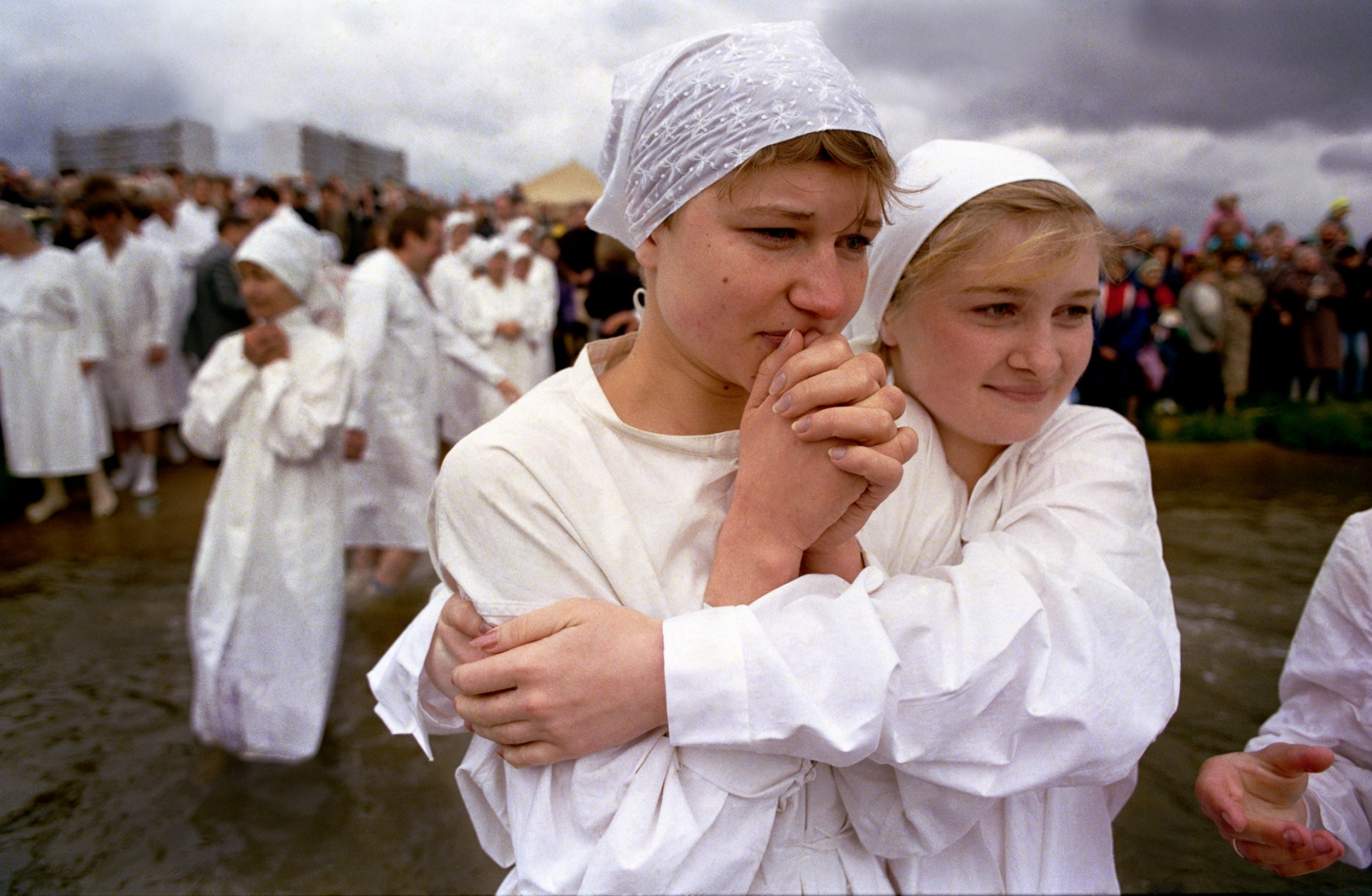 Russia In Transition - 1990s - Two young girls are among 190 people braving the cold...