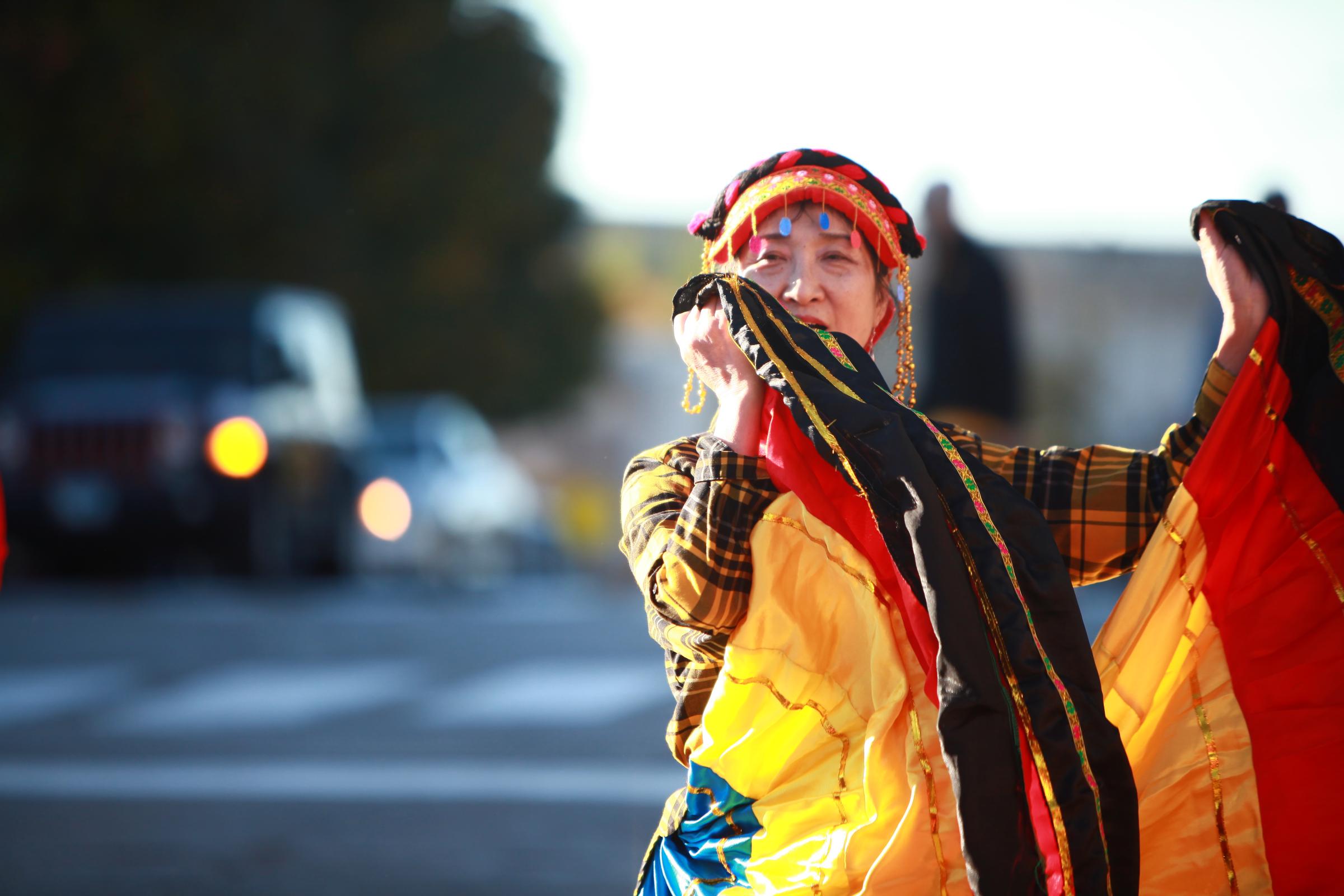 news/features - Li-Yang walks in the Homecoming Parade on Saturday, Oct....