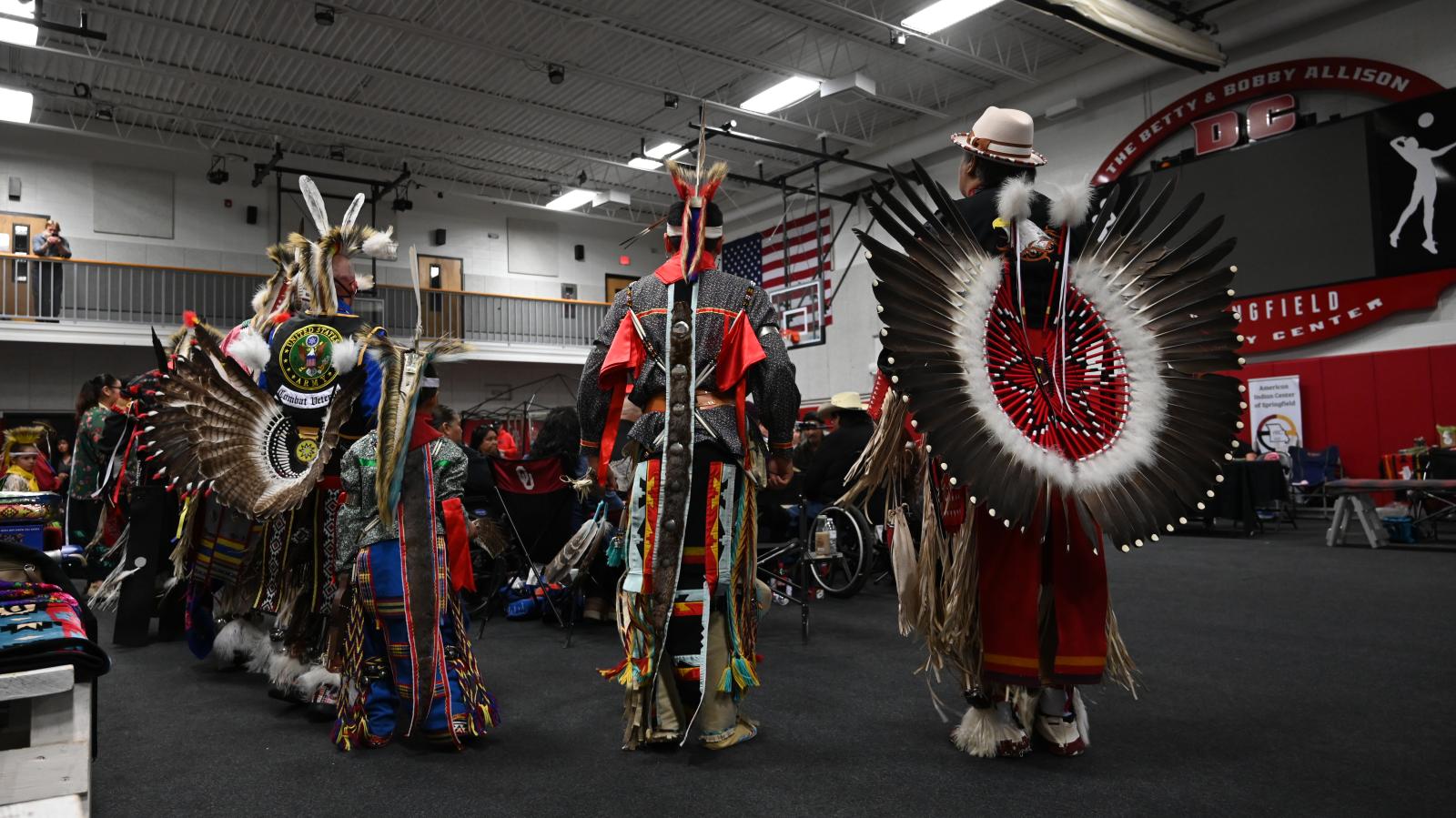 photo story - Dancers prepare for intertribal dance on Saturday, March,...