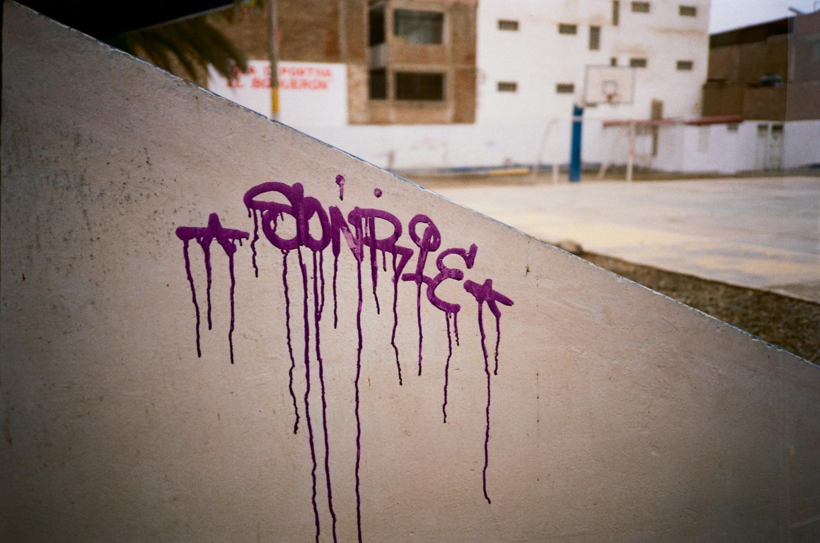 Drought -  Sprayed on a wall next to a basketball court in Huanchaco, the graffiti reading...