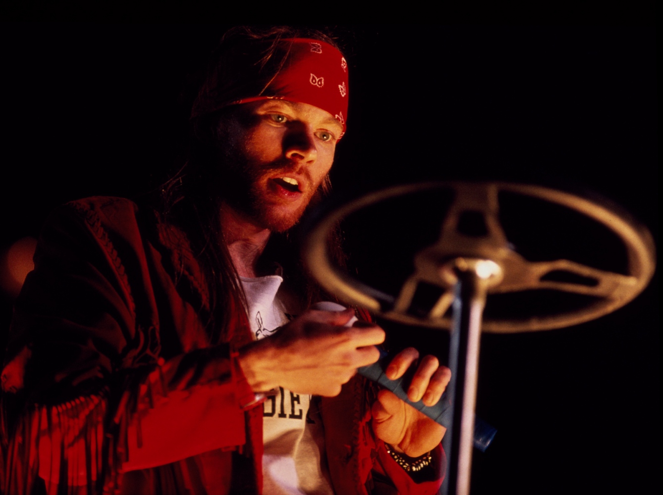 ROCK N ROLL FOR LIFE, NY TIMES MAGAZINE - Axl Rose of Guns n Roses on stage, 1991