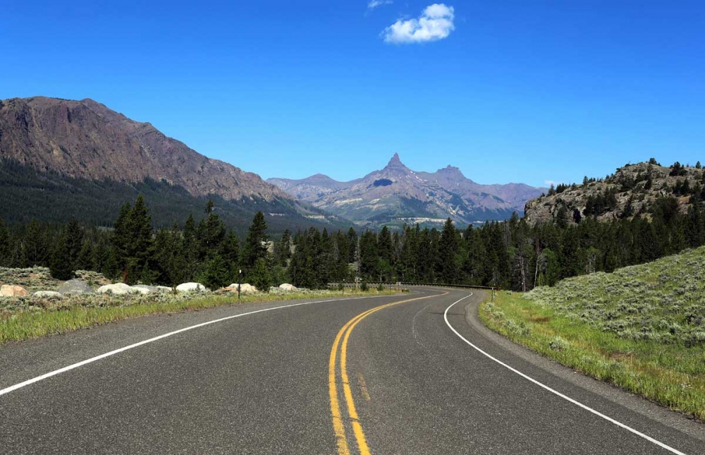 Mountains, plains and open sky are familiar scenes in Montana, pictured is Highway 212 near Cooke City. 