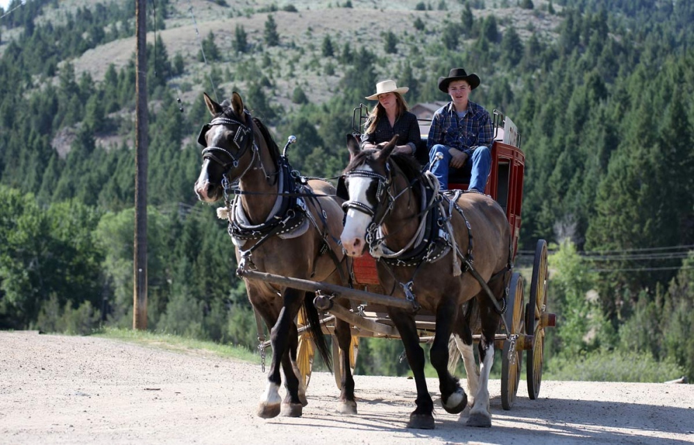  Ty Morgan and Rachel Billings rides a stagecoach on the very much alive ghost town of Virginia City, Montana. Frozen in time, it is a remarkably well preserved old west Victorian gold mining town. 