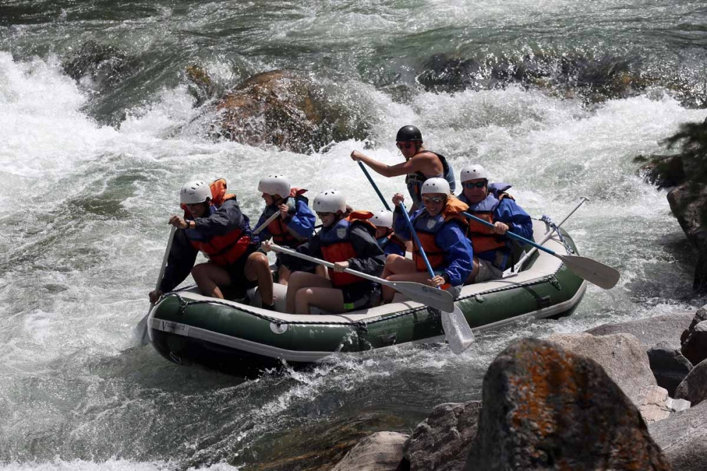  Montana's rivers are obscure, others are legendary. But nearly all of them have stories. Whitewater runs are popular among tourists and locals during the summer months. A group paddle down the white waters of the Gallatin River. 