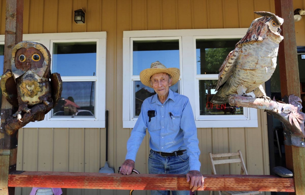  94 years old Bill Orhmann a retired cattle rancher who became a painter and sculptor at the age of 78, pose for a portrait in his gallery/museum in Drummond, Montana. 