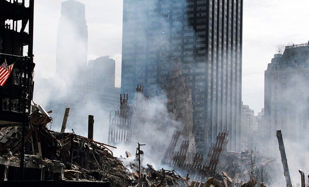 Image from Photojournalism -   Smokes billows at the World Trade Center site after the...