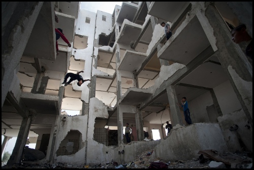   '3 Run Gaza' at the bombed out remains of a flat complex destroyed in 2014 during Israel's 'Operation Protective edge', Beit hanoun, Northern Gaza Strip.   