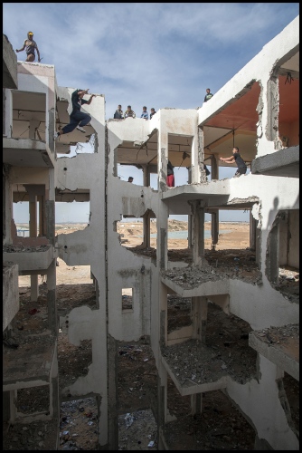    '3 Run Gaza' at the bombed out remains of a flat complex destroyed in 2014 during Israel's 'Operation Protective edge', Beit Hanoun, Northern Gaza Strip.   