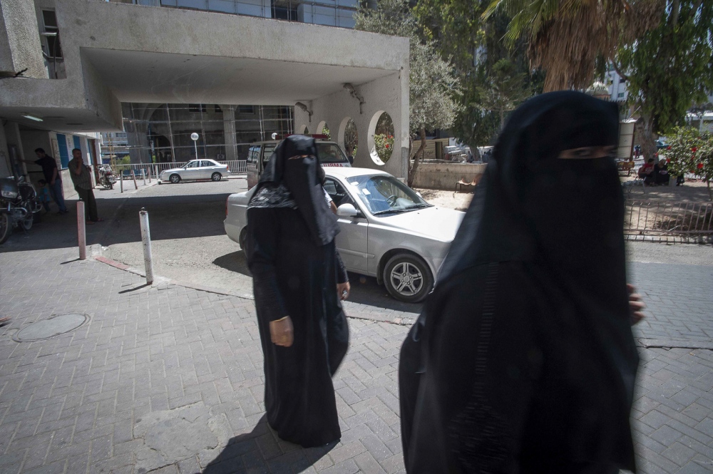  Women entering the Al Shifa (m...trips biggest public Hospital. 