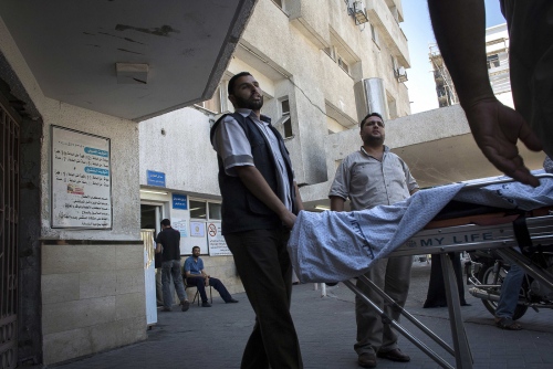 LITI in the Gaza Strip -   Patients being taken into the Al Shifa Hospital in Gaza...