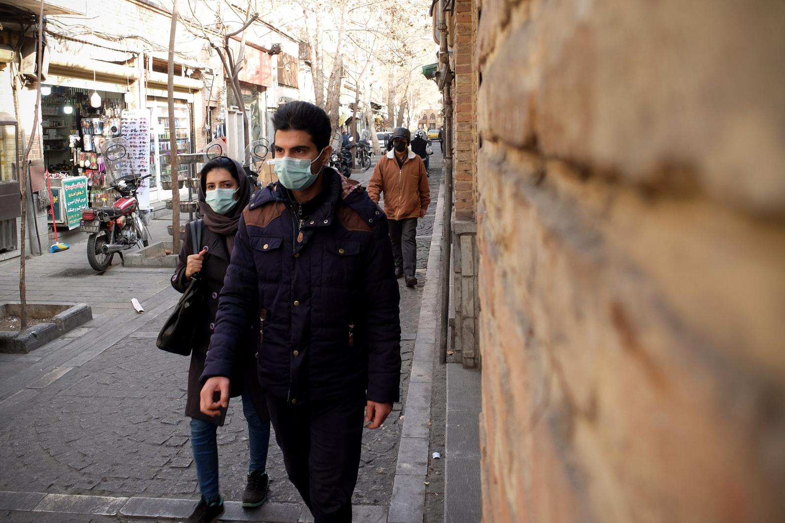An Iranian couple walks at Shap...39;s clerical rule. Tehran Iran