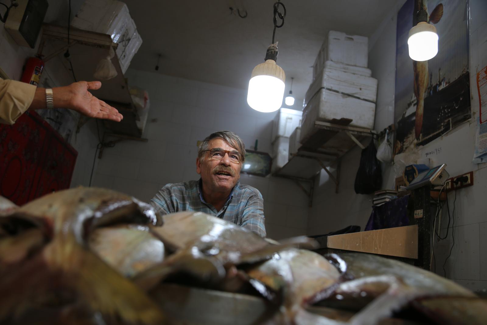 An Iranian fishmonger at the fi...n the Middle East. Bushehr Iran