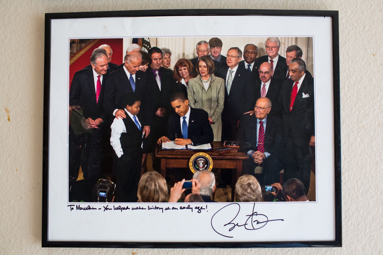  Marcelas Owens keeps a reminder of the "old Marcelas" in her familys living room. President Obama signed the picture, "To Marcelas....