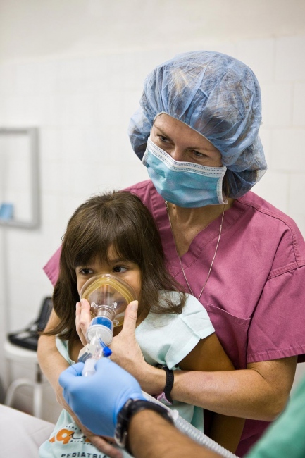 Medical Missions - Debbie Fritz, RN prepares Kettlen for surgery Aquiraz,...