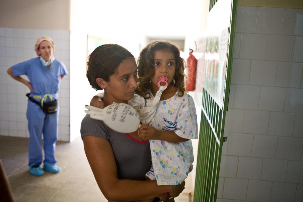 Evelyn and Luzirene walk into the operating room followed by Robin Birchenough, CRNA Aquiraz, Brazil, 2008   For Healing the Children Northeast  
