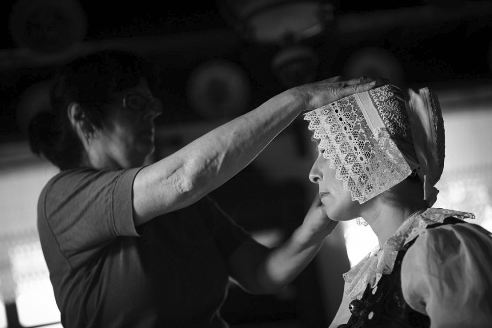  donning the headdress worn by married women 