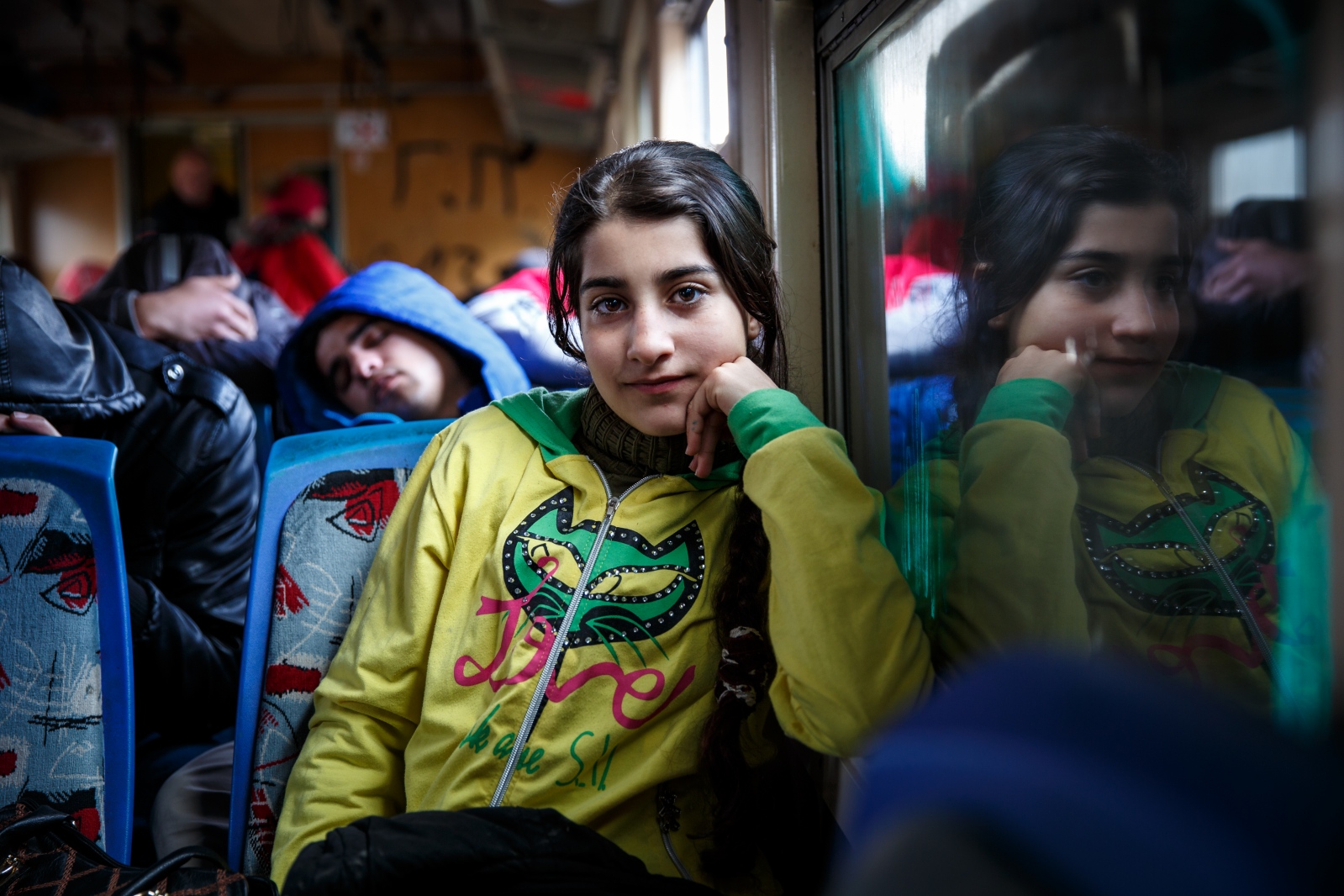 Maram, 13, a refugee from Daraa, Syria, takes the train with her family from Presevo, Serbia, to the Croatian border. From there, they will...