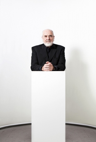 PORTRAITS - Pistoletto, artist, posing on one of his sculture in his...