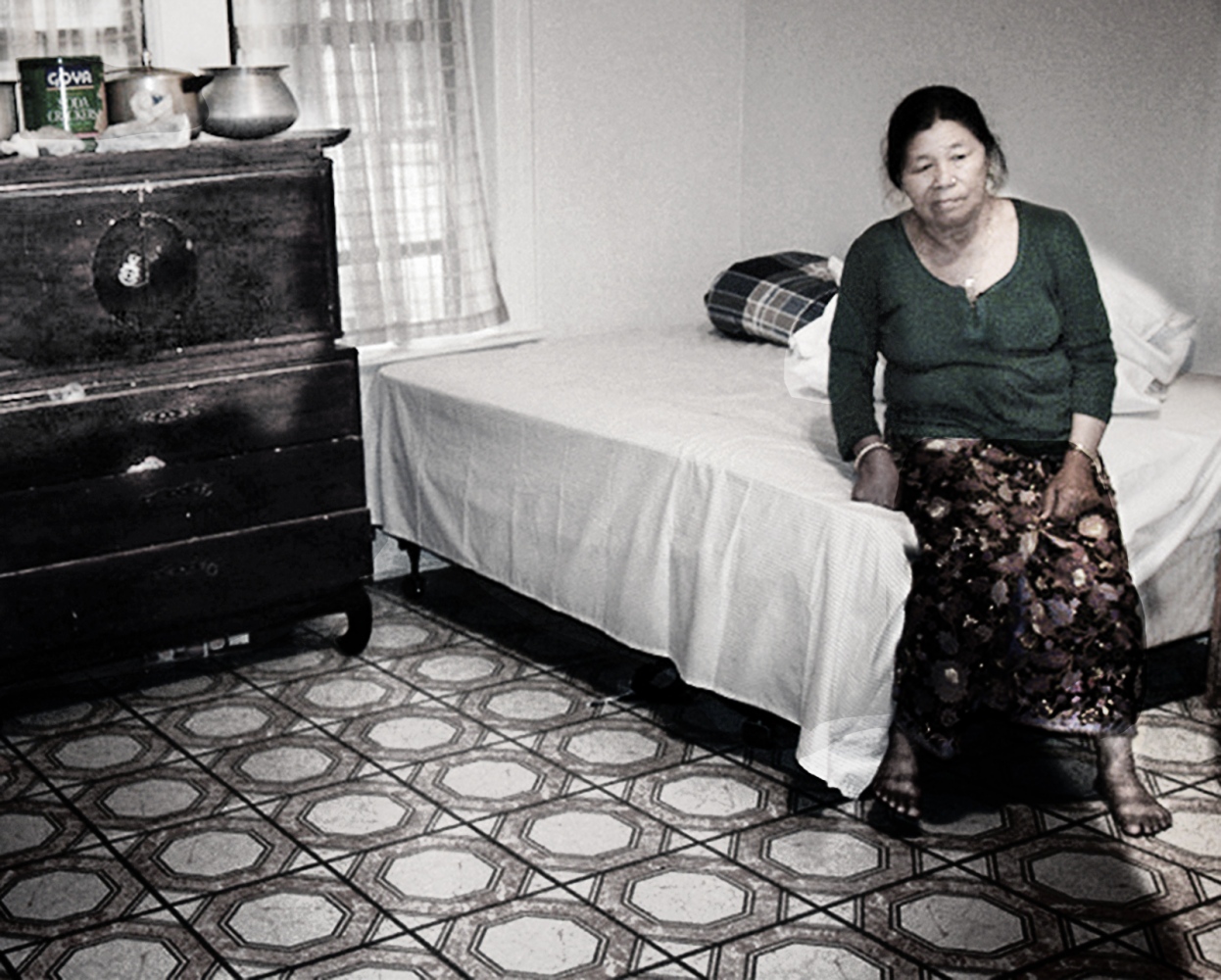 Refugees Resettle - Phul Tamang, family matriarch, suffered acute culture...