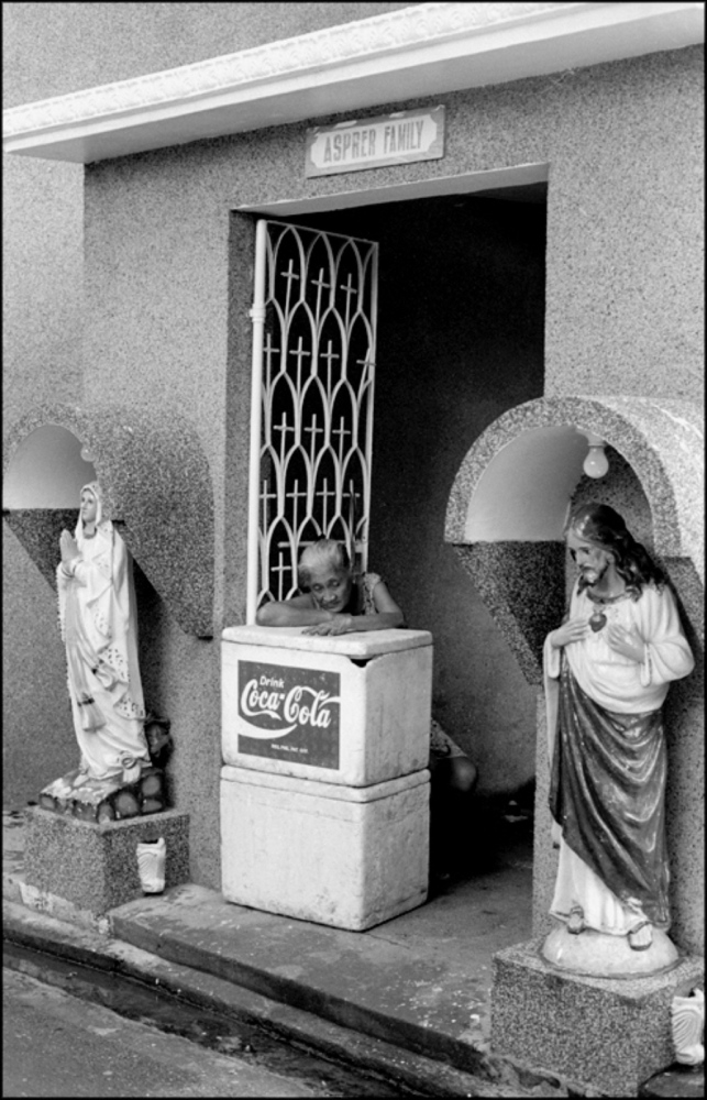 Philippines, Cemeteries -                  Lady Resting on Coca-Cola, South...