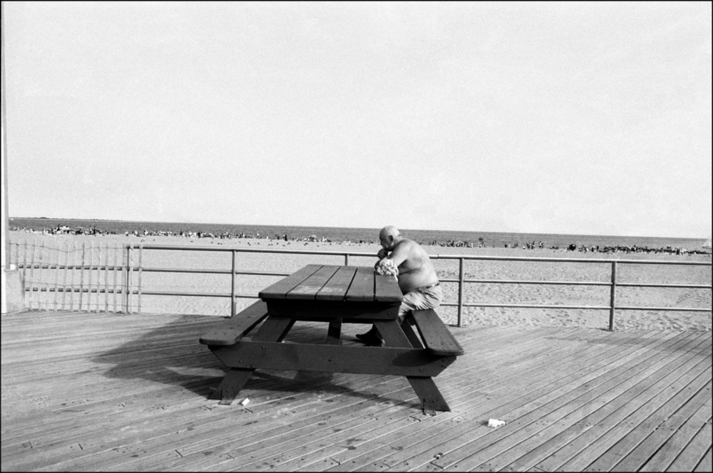  Alone at Table, Coney Island, NY, July 4, 2004 