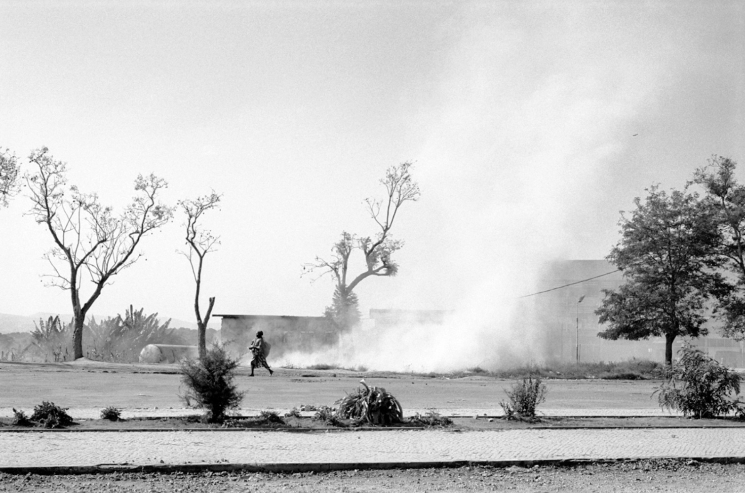 Angola's Civil War -  Smoking Trail, Huambo, Angola, July 2000 